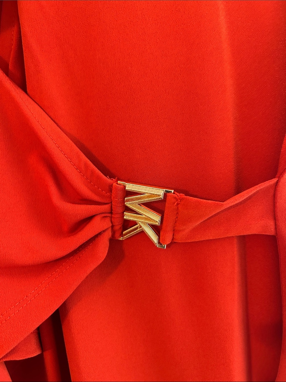Women’s Orange Long-Sleeve Wrap Top with Gold Accent - Picture 2 of 3